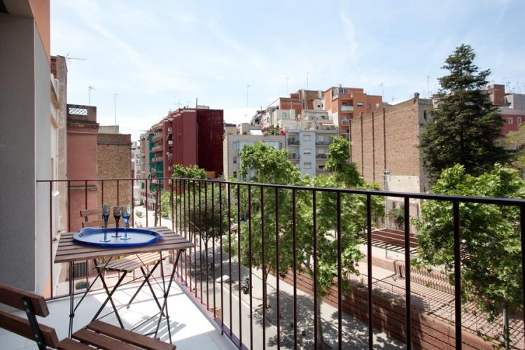 The apartment has a balcony, and the common terrace