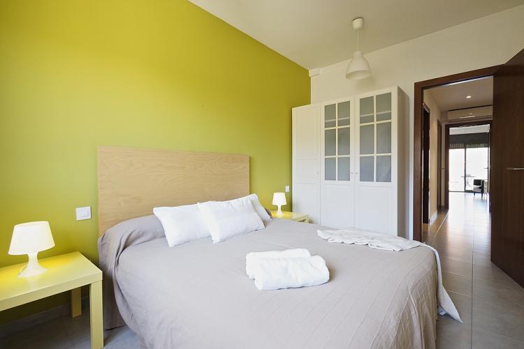 The main bedroom features a double bed and a perfect storage for longer stays