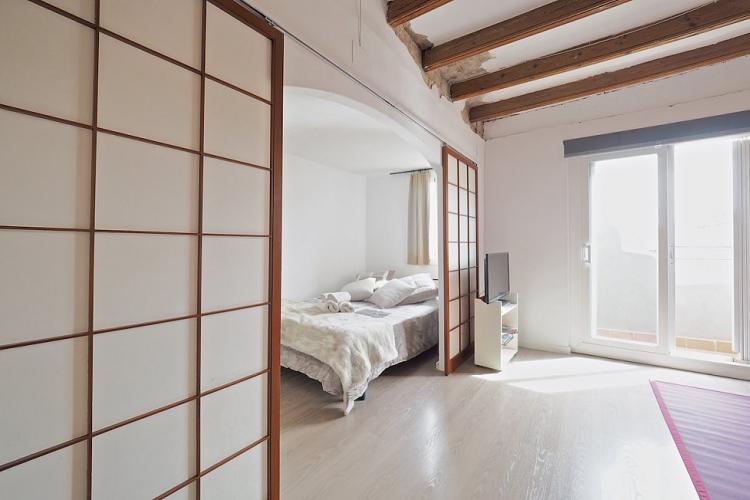 Japanese inspired wooden sliding doors provide a zen feel to the apartment.