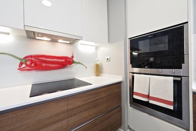 Vibrant red image of a chili pepper adds a touch of color to the space.