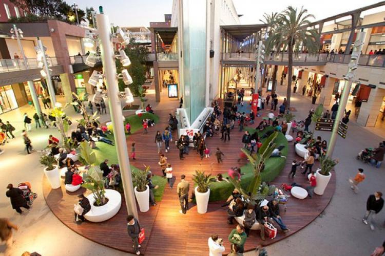 Visit the La Maquinista, an enormous shopping center nearby.