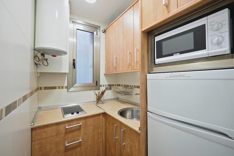 This lovely kitchen is fully equiped for your convenience.