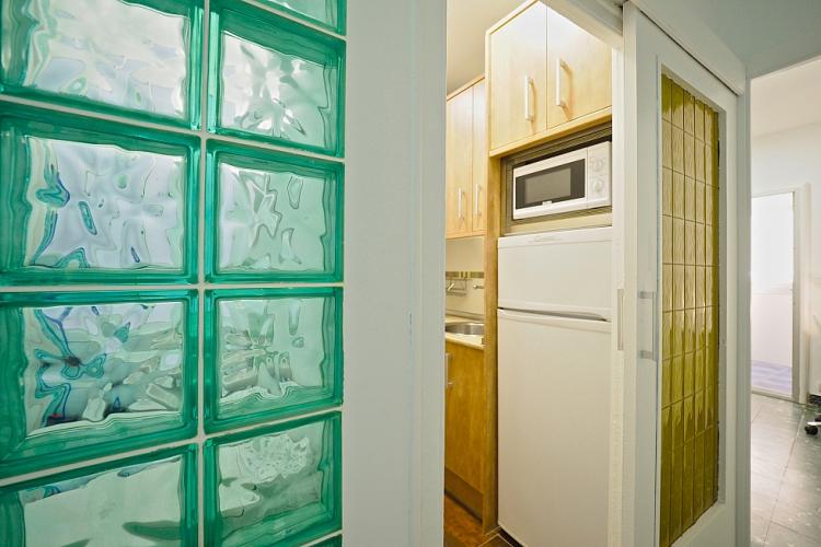 Close to the bathroom you will find a beautiful sliding door that leads to the kitchen.