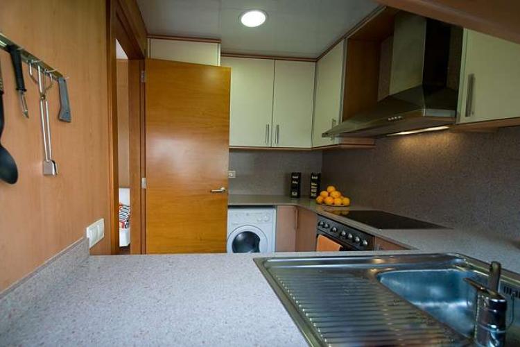 Fully equipped kitchen with everything necessary for preparing meals during your stay. Washing machine also in the kitchen.